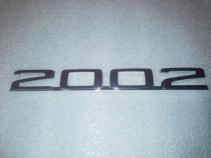 (02 models) 2002 Rear Panel Badge >71 & 71>