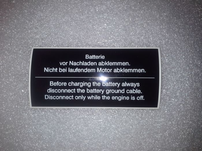 (E9 2.5CS-3.0CSL) Battery warning Sticker